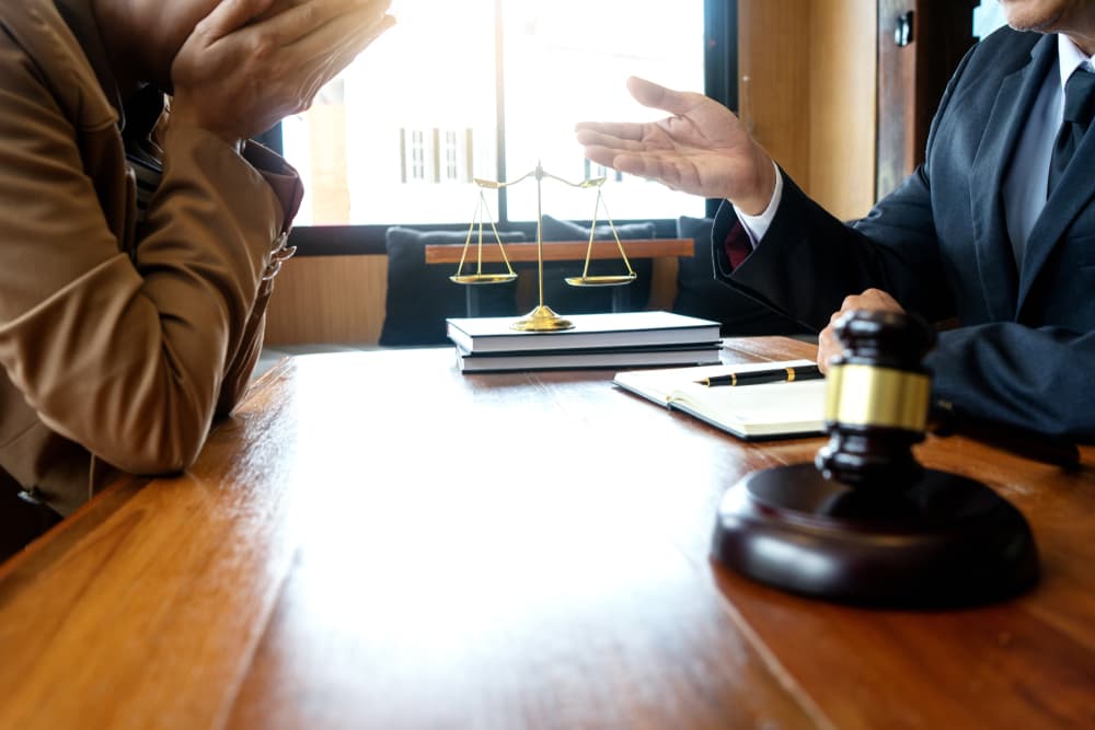 Wrongful Death Attorney meeting with family member who lost loved one.