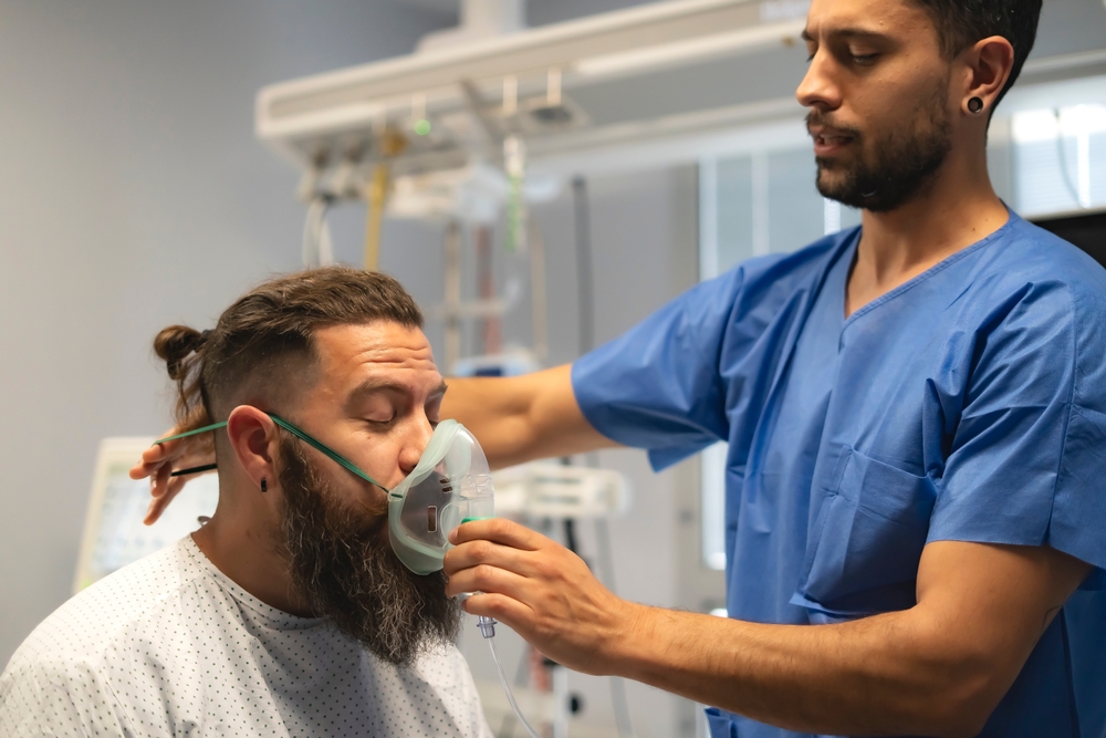 A patient receives breathing treatment