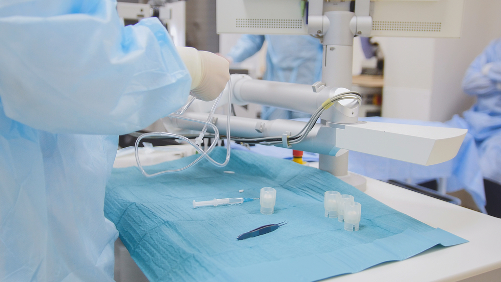 Surgeons and anesthesiologists preparing for surgery